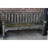 A modern slatted garden bench, 155cm wide.