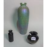 A contemporary glass vase with ribbed sides, another with gilded decoration and one other (3).