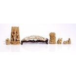 A group of Asian ivory carvings, 19th/early 20th century, comprising; a Canton ivory tusk,