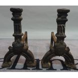 A pair of 18th century iron fire dogs, 45cm long x 41cm high.