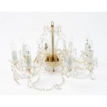 A Modern Italian eight light chandelier, with scrolled branches,