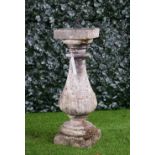 A 19th century sundial, on semi-acanthus carved sandstone baluster column and square base,