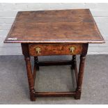 A late 17th century oak side table, the moulded rectangular top above a frieze drawer,