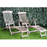 Barlow Tyrie; a pair of teak steamer reclining easy armchairs, 62cm wide x 170cm long (2).