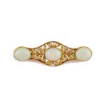 A gold, opal and diamond brooch, of shaped elliptical form, mounted with three oval opals,