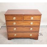 A George III mahogany chest, of two short and three long graduated drawers on bracket feet,