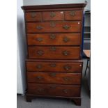 A George III mahogany chest on chest, of two short and six long graduated drawers, on bracket feet,