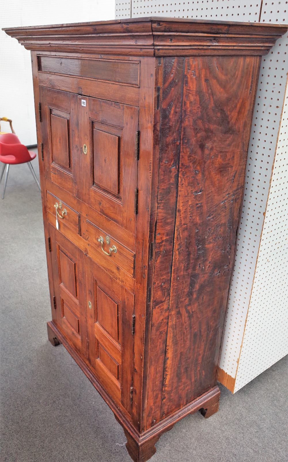 A George III style oak cupboard,