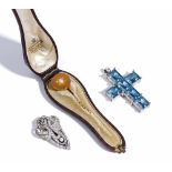 A Victorian gold and half pearl set stick pin, the circular top star set with a single half pearl,