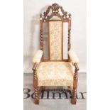 An 18th century style oak open armchair on barley twist supports,