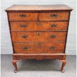 A George III pollard oak chest on stand with two short and three long graduated drawers,