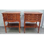 A pair of George III style figured yew three drawer side cabinets on splayed square supports united