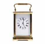 A French gilt-brass cased carriage clock, with visible platform escapement,