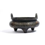 A large Chinese Islamic market bronze tripod censer, six character Xuande mark but later,