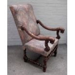 A mahogany framed square back open armchair with beast head arm finials on barley twist supports,