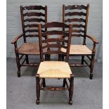 A matched set of eight 18th century ash rush seated ladderback dining chairs,