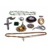 A gilt metal necklace, spaced with jade beads at intervals, six brooches, a turquoise pendant,