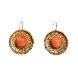 A pair of gold and coral earrings,