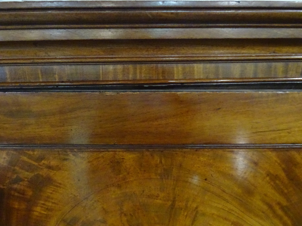 A George III mahogany linen press with moulded cupboard doors over two short and one long drawer, - Image 9 of 9