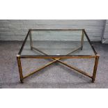 A mid 20th century glass and lacquered brass square coffee table,