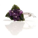 A white gold, carved nephrite, carved amethyst quartz and diamond brooch,