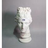 A modern white plaster bust formed as a classical female, 49cm tall.