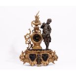 A French gilt spelter and black slate mantel clock,