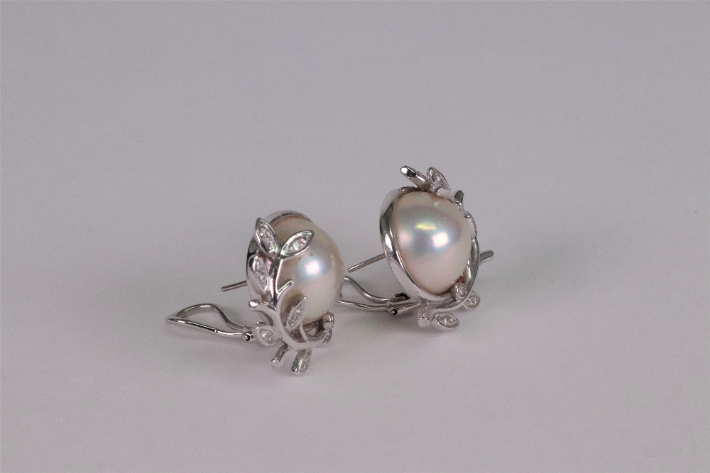 A pair of mabé pearl, 18ct white gold and diamond set earclips, - Image 2 of 2