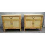 A pair of 18th century style French duck egg blue and yellow painted side cabinets,