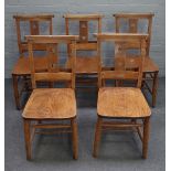 A set of eight early/mid-20th century beech chapel chairs,