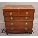A George III inlaid mahogany chest of four long graduated drawers on bracket feet.