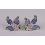 A pair of carved lavender jadeite,