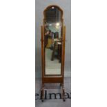 A 20th century mahogany framed arch top cheval mirror, 44cm wide x 164cm high.
