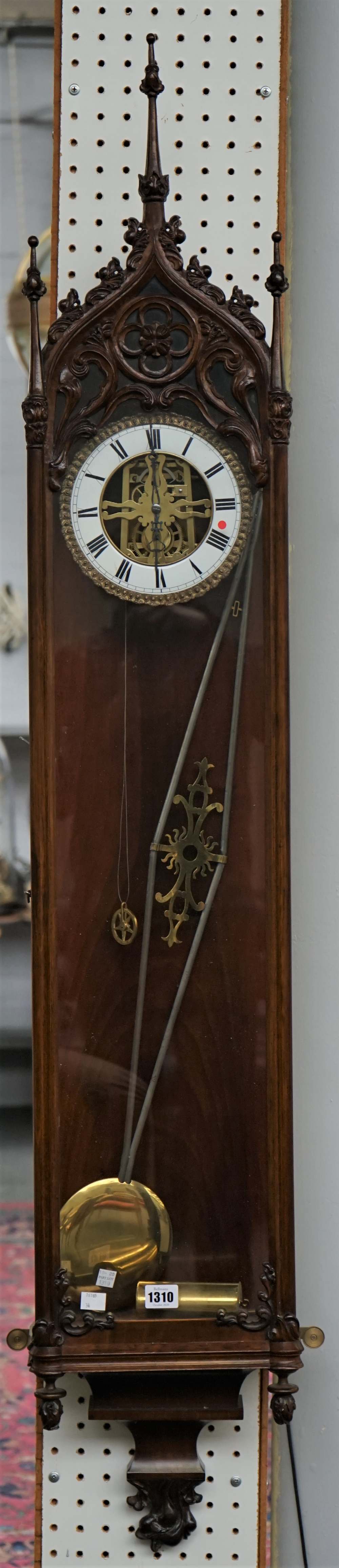 A mid-19th century mahogany Gothic Revival Vienna style regulator wall clock,
