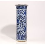 Chinese tall blue and white beaker vase, late 19th century, painted with lotus flowers and tendrils,