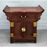 An early 20th century Chinese hardwood side cabinet,
