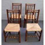 A set of four ash and elm spindle back chairs, early 19th century, with three baluster turnings,