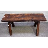 A rustic oak pig bench, 18th/19th century, the rectangular top on splayed spreading legs, 91.