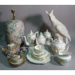 Ceramics; a large white glazed model of a parrot,