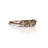 A platinum and diamond set three stone ring,