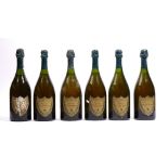 Six bottles of Dom Perignon vintage champagne, five 1966 and one having the label deteriorated.