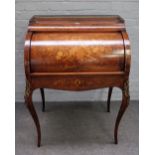 A late 19th century French floral marquetry inalid rosewood cylinder bureau, on cabriole supports,