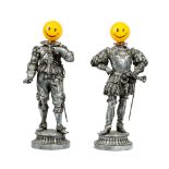 A pair of novelty silvered metal figures,