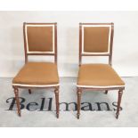 A pair of Louis XVI style side chairs on fluted supports, 44cm wide x 83cm high (2).