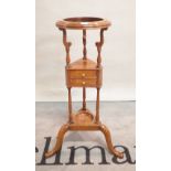 A George III style mahogany washstand on three downswept supports,