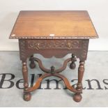 An 18th century continental oak single drawer side table on X frame stretcher,