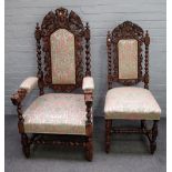 A set of seven late 19th century carved oak dining chairs on barleytwist supports,