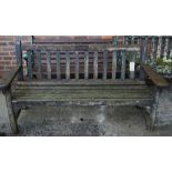 A modern slatted garden bench 155cm wide.