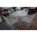 A suite of white painted wire work garden furniture to comprise circular table,