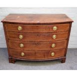 A George III inlaid mahogany bowfront chest of four long graduated drawers on bracket feet,